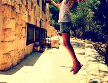 In Ein Yael, the living museum, Jerusalem. Herzensmädchen jumping, flying high